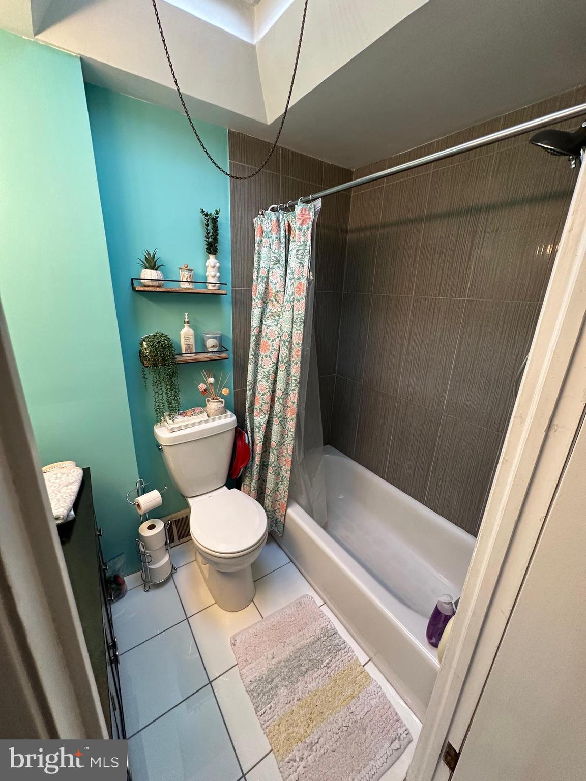 1818 Packer Avenue Philadelphia, PA 19145 - Photo 14 of 23 a bathroom with a toilet and a shower