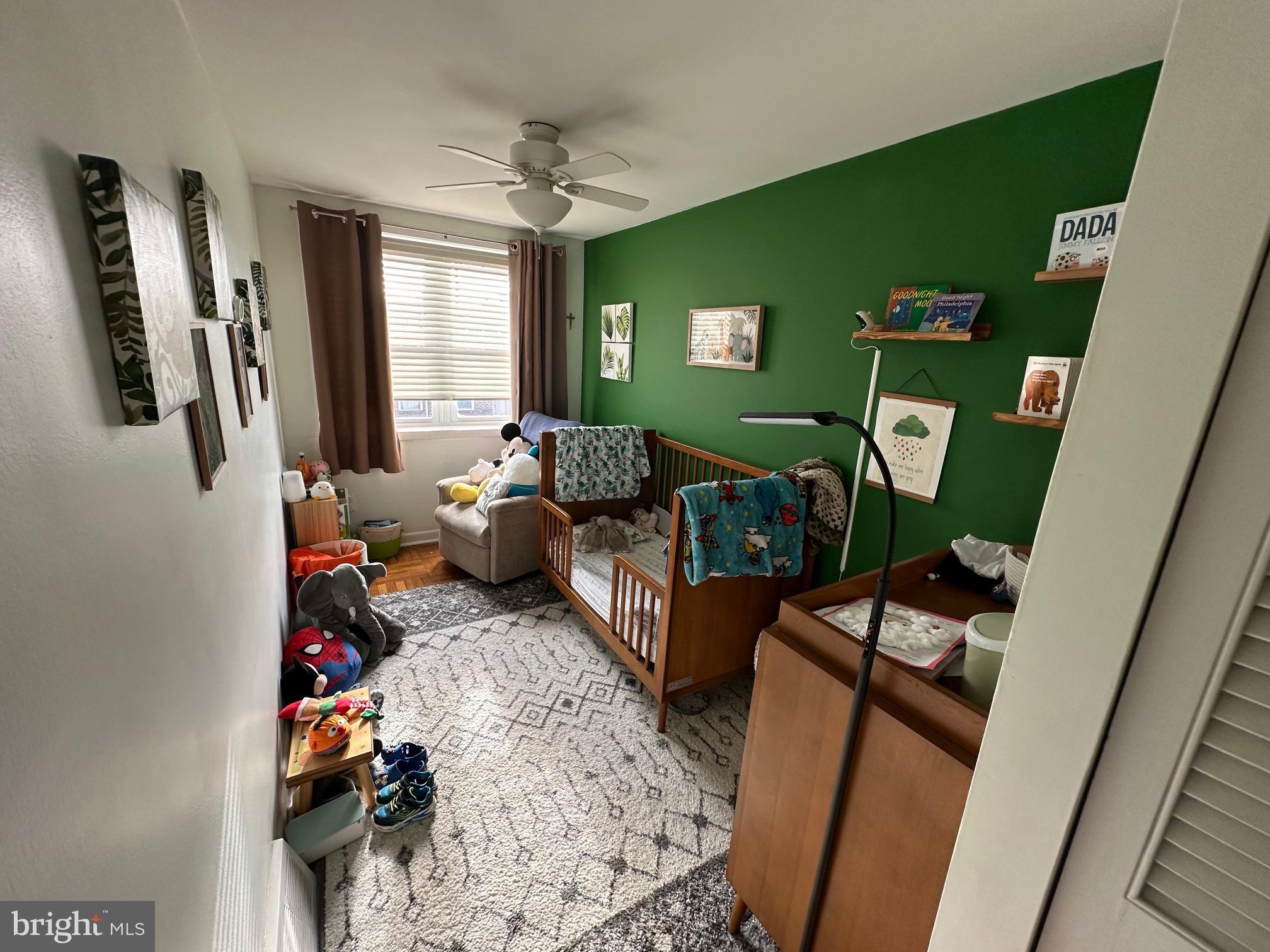 1818 Packer Avenue Philadelphia, PA 19145 - Photo 23 of 23 a living room with furniture and a flat screen tv