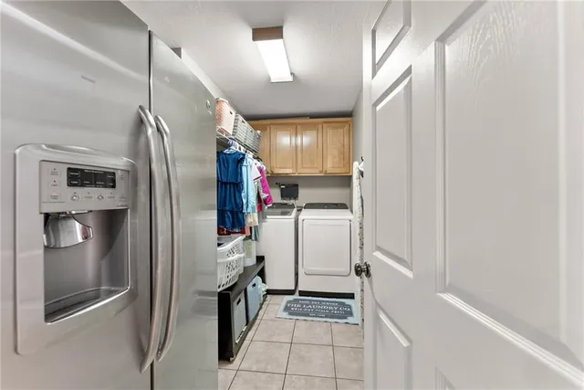 a bedroom with a bed and a dresser in it