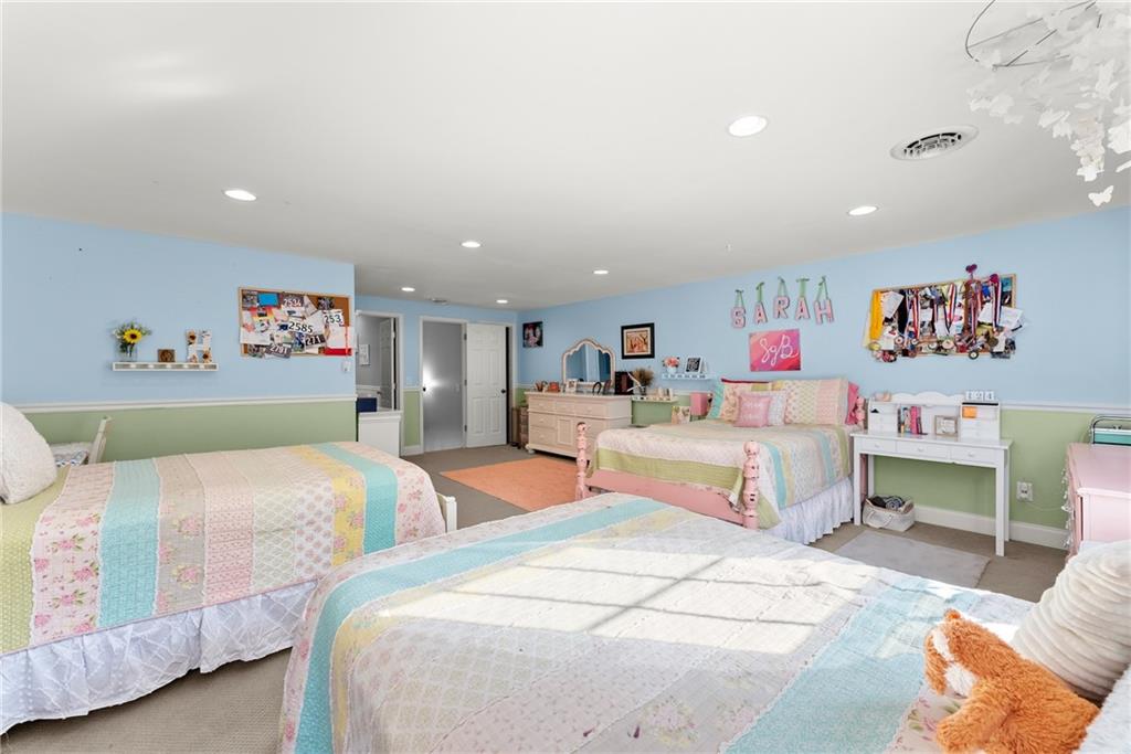 125 Rainbow Circle Cleveland, GA 30528 - Photo 26 of 83 a bedroom with two beds and a painting on the wall