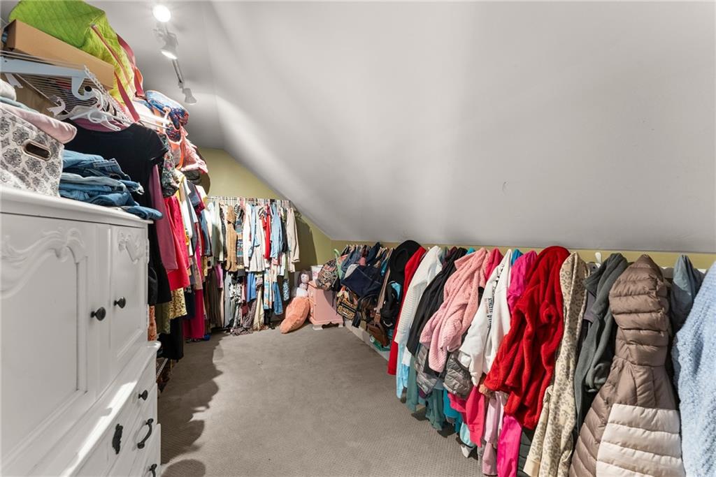 125 Rainbow Circle Cleveland, GA 30528 - Photo 29 of 83 a view of walk in closet with clothes