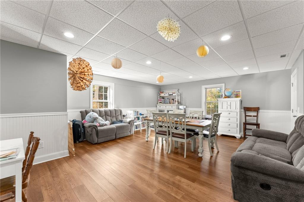 125 Rainbow Circle Cleveland, GA 30528 - Photo 33 of 83 a living room with lots of furniture and a wooden floor