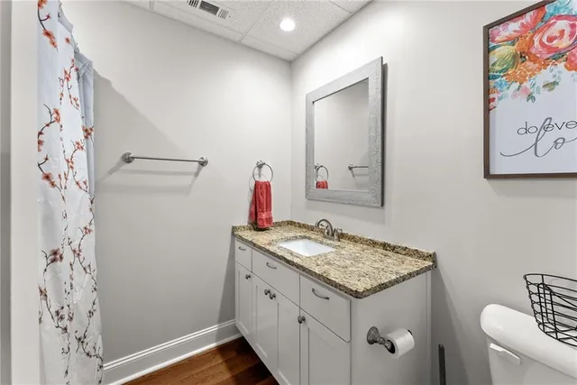 a bedroom with a bed furniture and a window