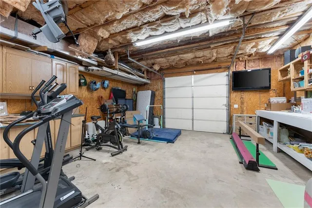 a white toilet sitting next to a bathroom sink