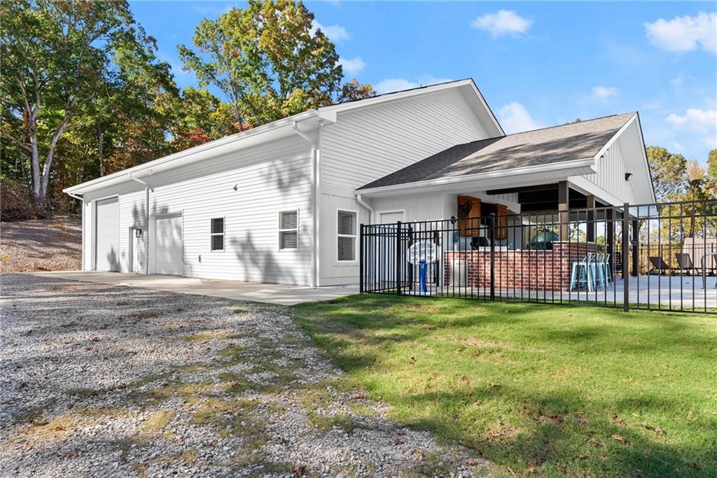 125 Rainbow Circle Cleveland, GA 30528 - Photo 39 of 83 a view of a house with backyard and a tree