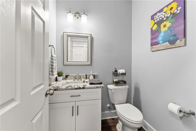 a view of a city with lush green forest