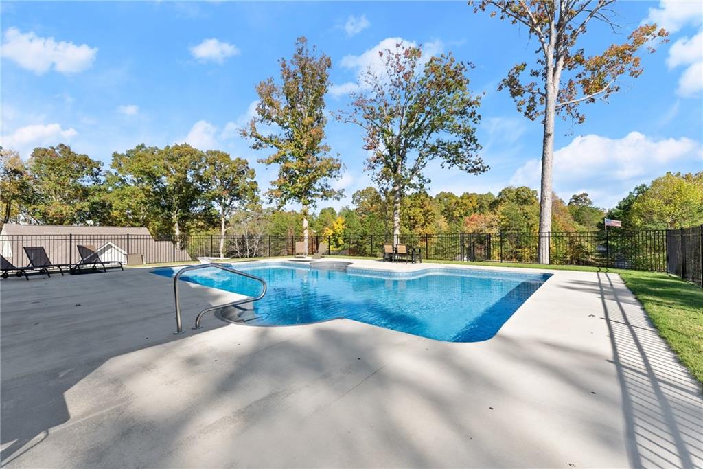 125 Rainbow Circle Cleveland, GA 30528 - Photo 66 of 83 a view of swimming pool and a yard