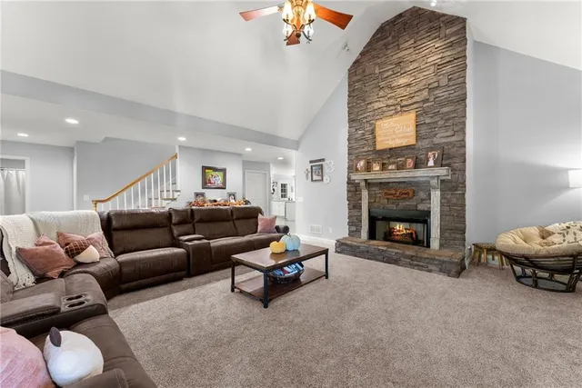 a kitchen with stainless steel appliances a refrigerator stove microwave and sink