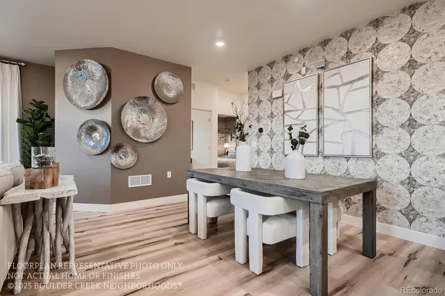 a view of a table and chairs in a room
