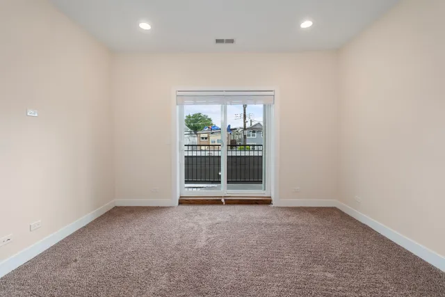 a bathroom with a bathtub a sink and a mirror