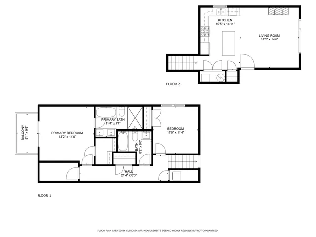 a view of a house with many windows and a yard