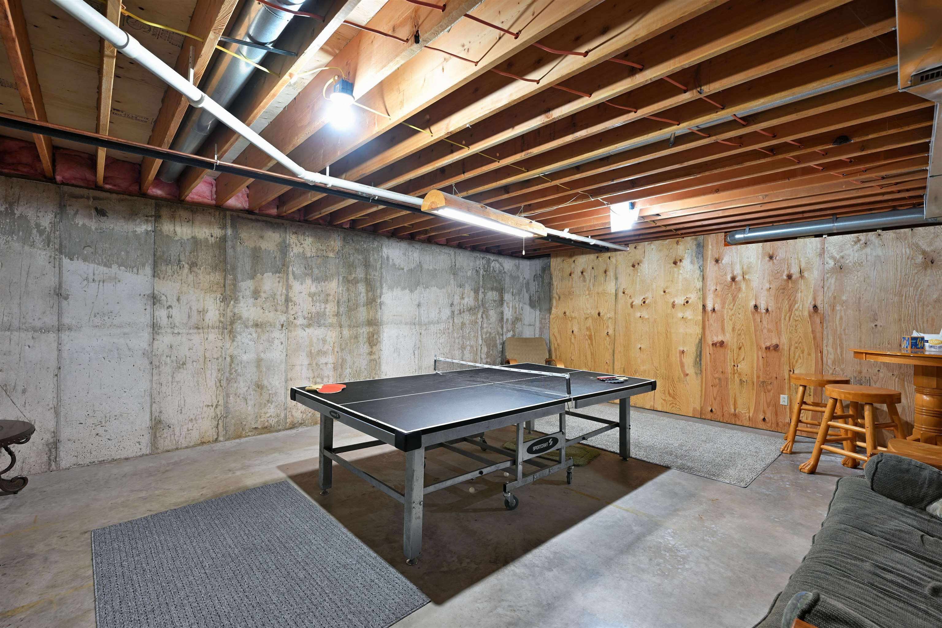 13672 East Short Road Gordon, WI 54838 - Photo 74 of 75 Playroom with concrete flooring
