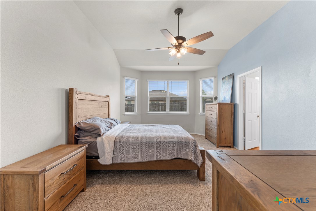 308 Kayla Street Troy, TX 76579 - Photo 20 of 32 a bedroom with a bed dresser and a window
