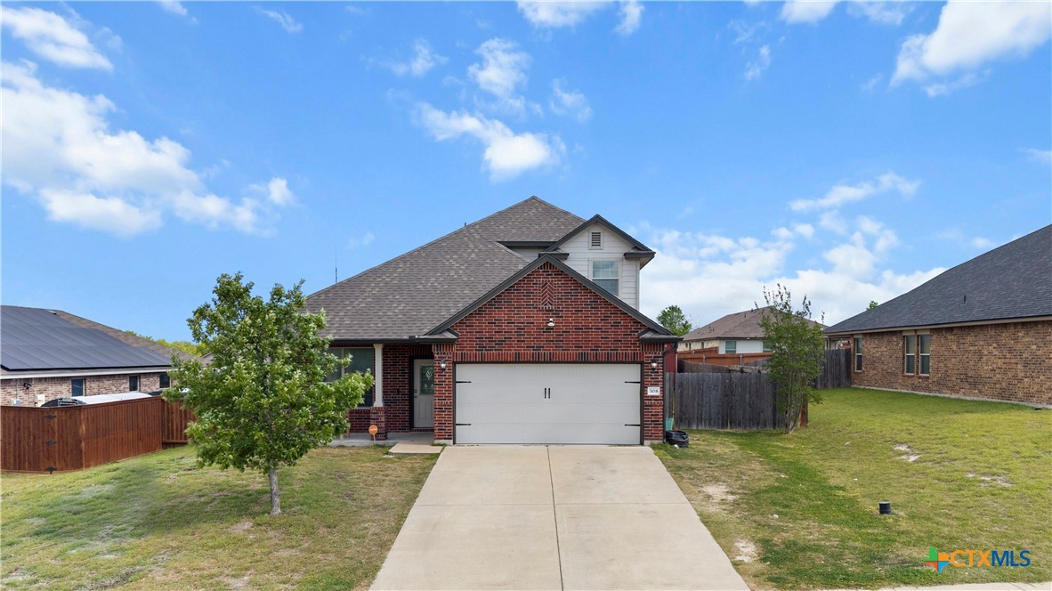 308 Kayla Street Troy, TX 76579 - Photo 2 of 32 a front view of a house with garden