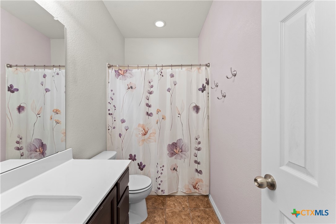 308 Kayla Street Troy, TX 76579 - Photo 29 of 32 a bathroom with a sink toilet and shower