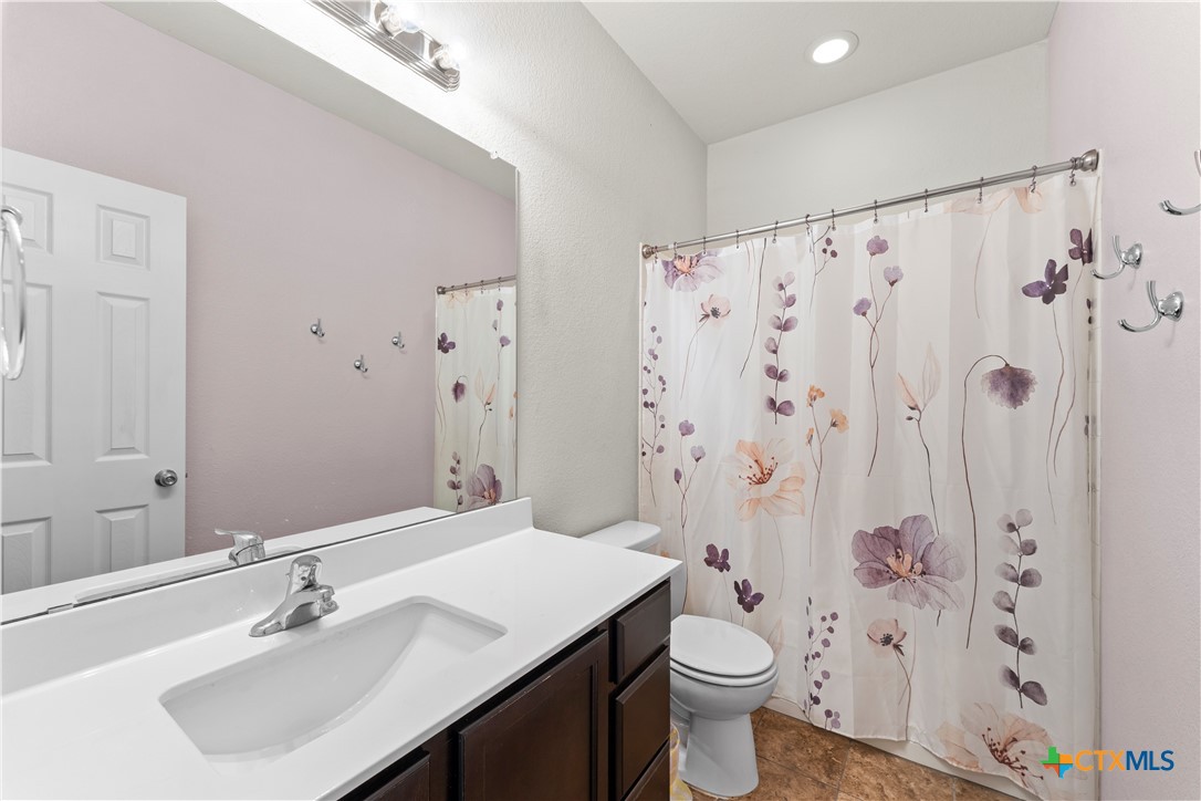 308 Kayla Street Troy, TX 76579 - Photo 30 of 32 a bathroom with a sink and toilet