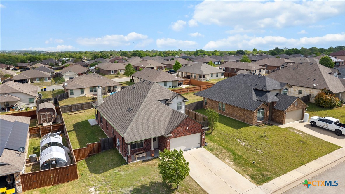 308 Kayla Street Troy, TX 76579 - Photo 3 of 32 an aerial view of a house with swimming pool and mountains