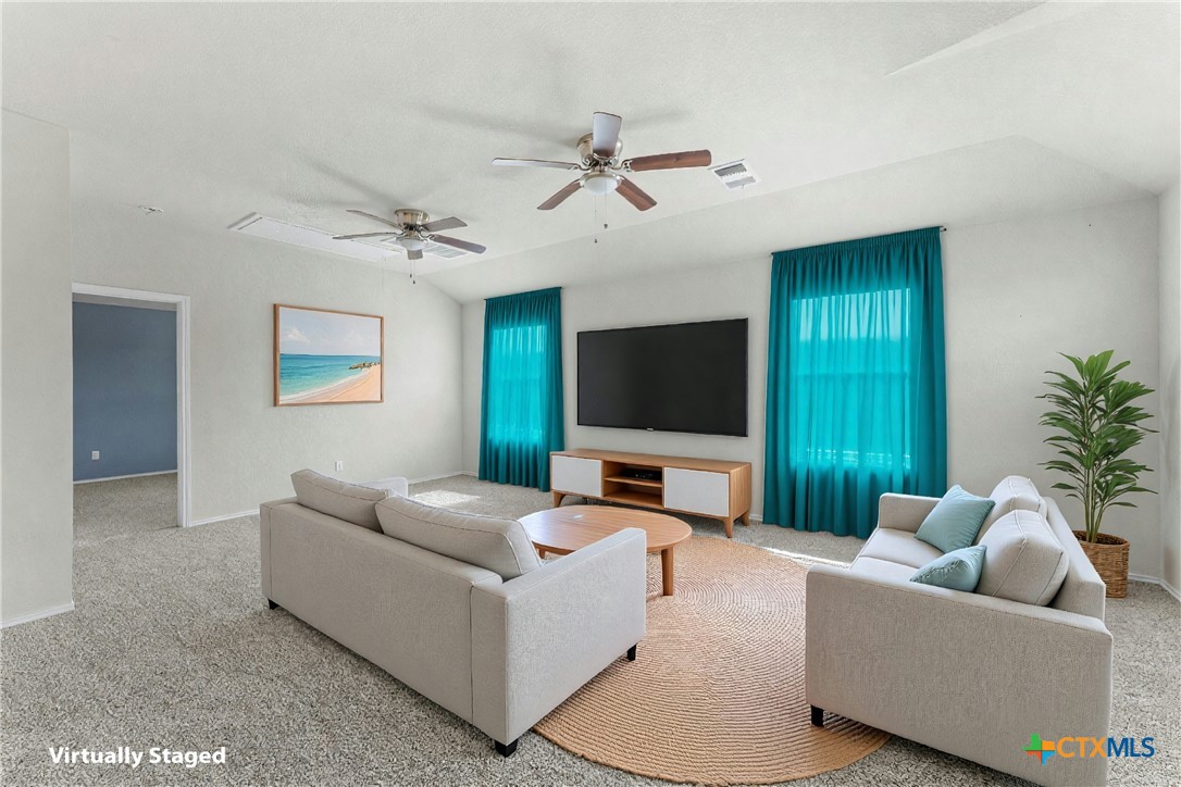 308 Kayla Street Troy, TX 76579 - Photo 8 of 32 a living room with furniture and a flat screen tv