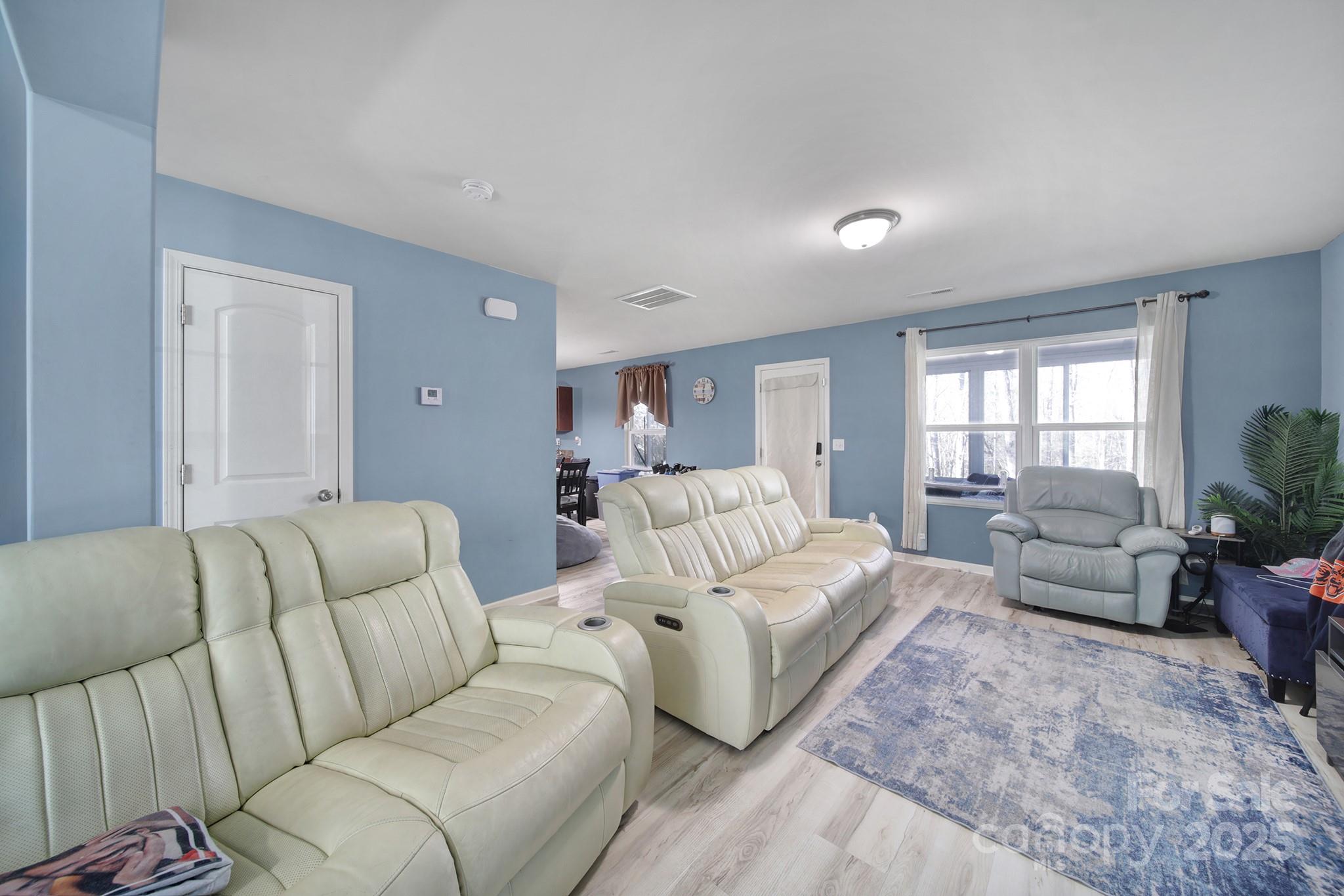 1708 Millwood Road Lancaster, SC 29720 - Photo 15 of 40 a living room with furniture and a large window