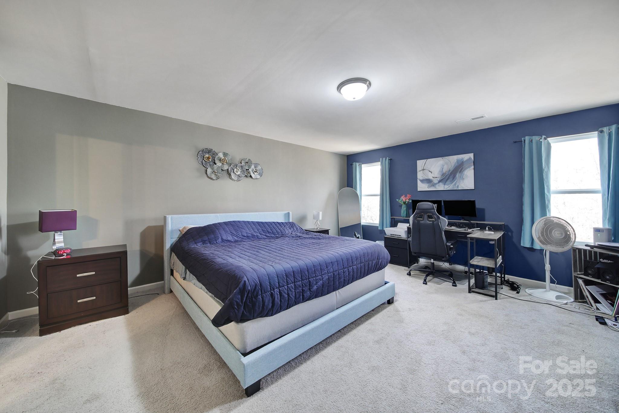 1708 Millwood Road Lancaster, SC 29720 - Photo 25 of 40 a bedroom with a bed and furniture