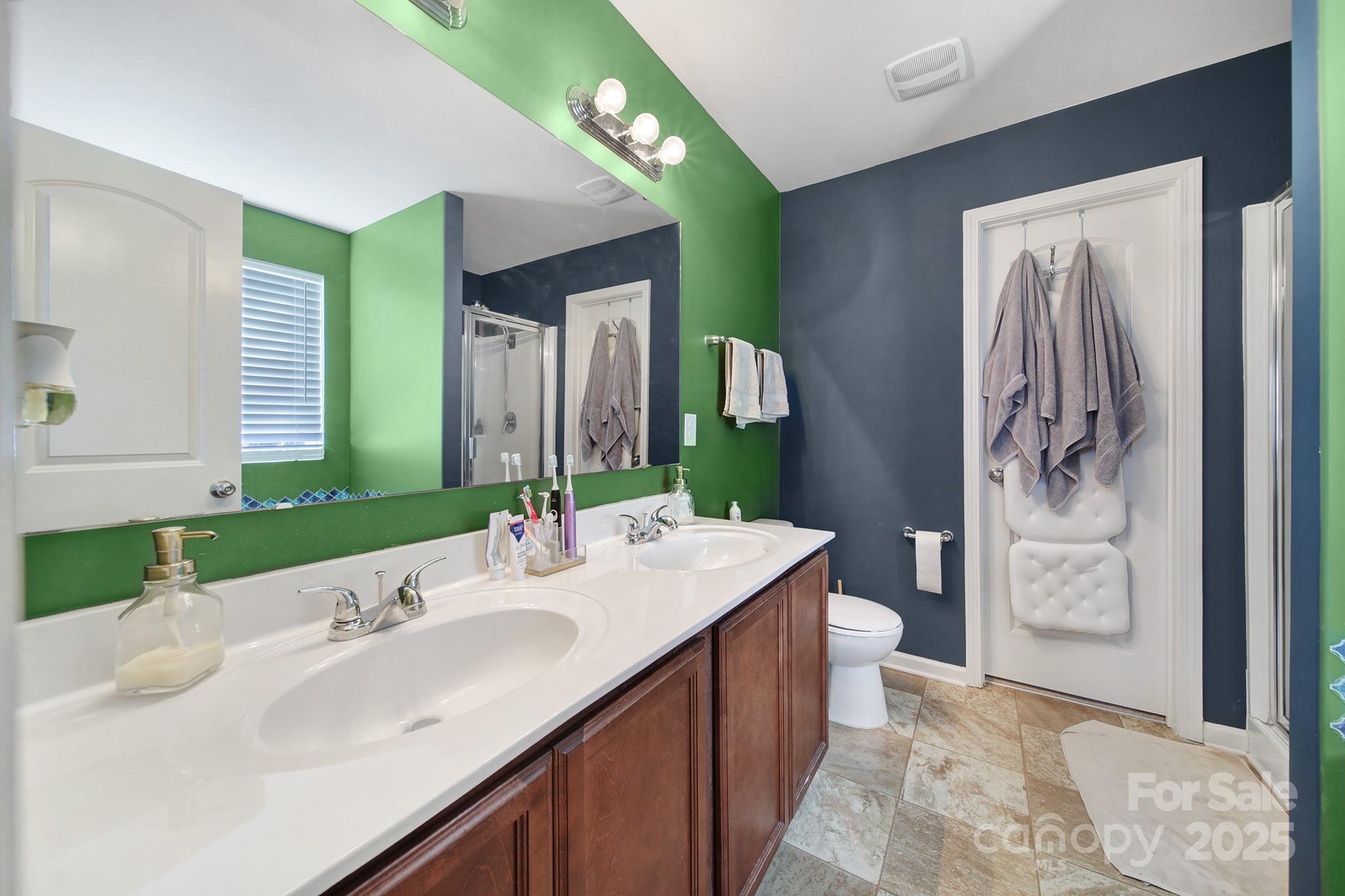 1708 Millwood Road Lancaster, SC 29720 - Photo 28 of 40 a bathroom with a sink and a mirror