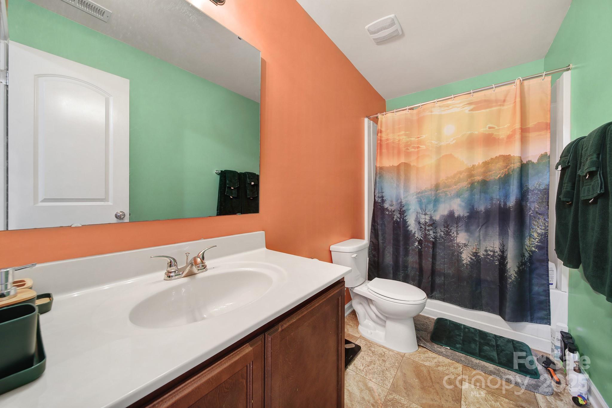 1708 Millwood Road Lancaster, SC 29720 - Photo 34 of 40 a bathroom with a sink and a mirror
