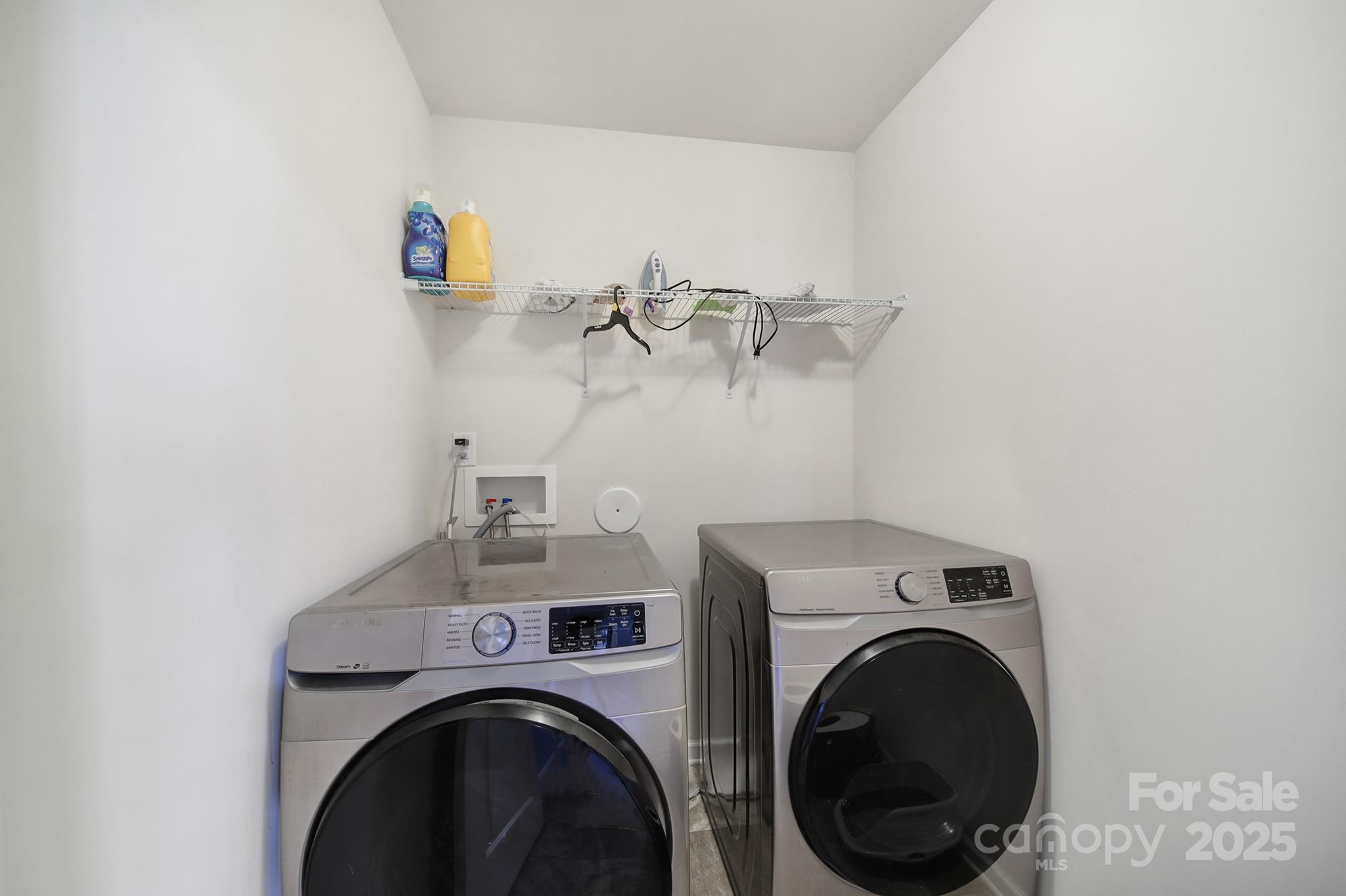1708 Millwood Road Lancaster, SC 29720 - Photo 38 of 40 a view of storage and utility room with washer and dryer