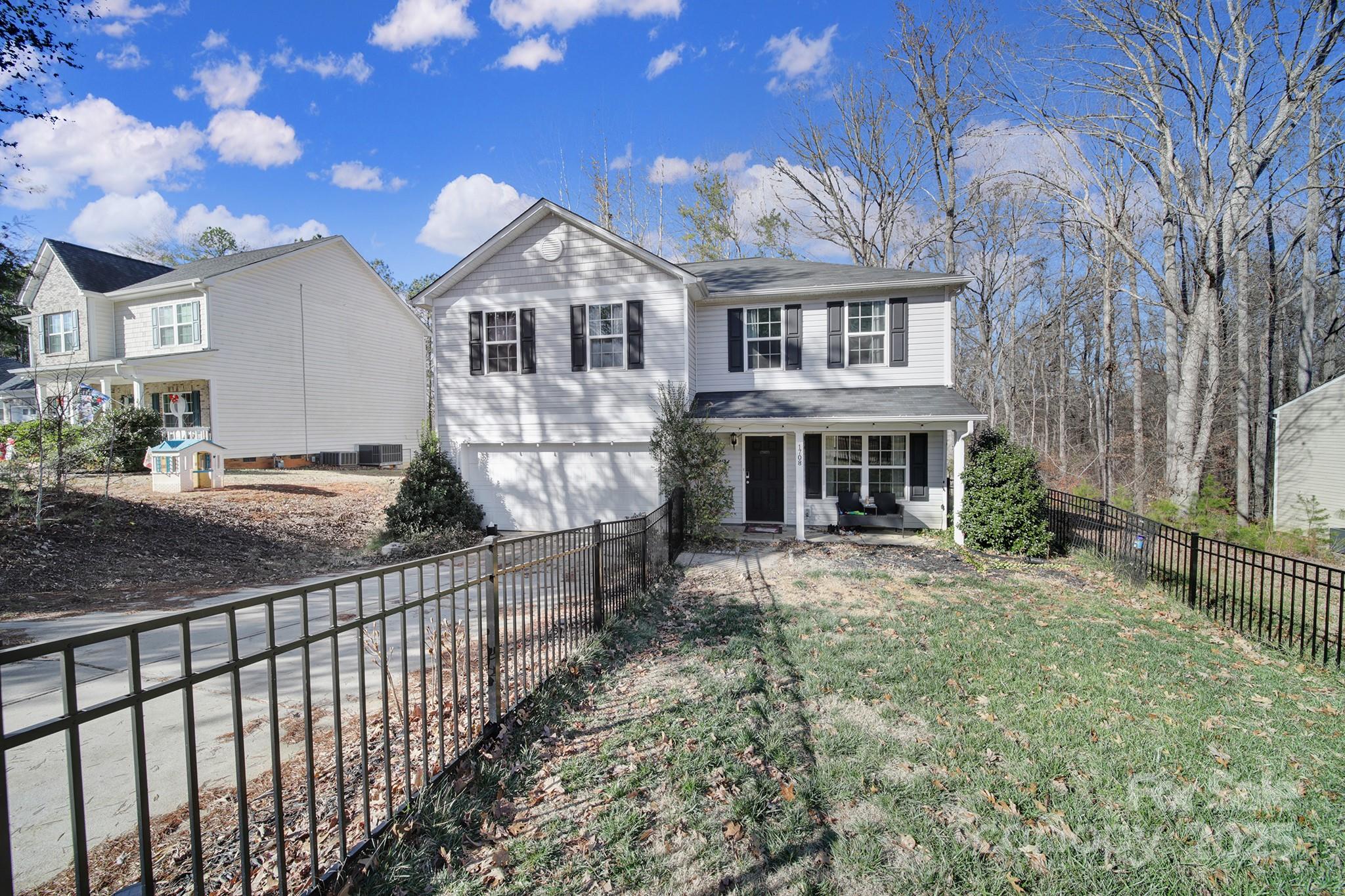 1708 Millwood Road Lancaster, SC 29720 - Photo 4 of 40 a front view of a house with yard