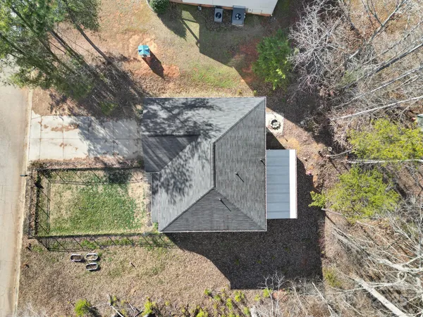 a view of a backyard of the house