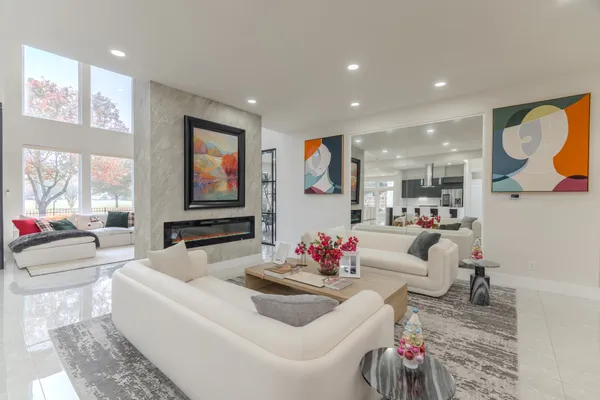 a living room with furniture and window