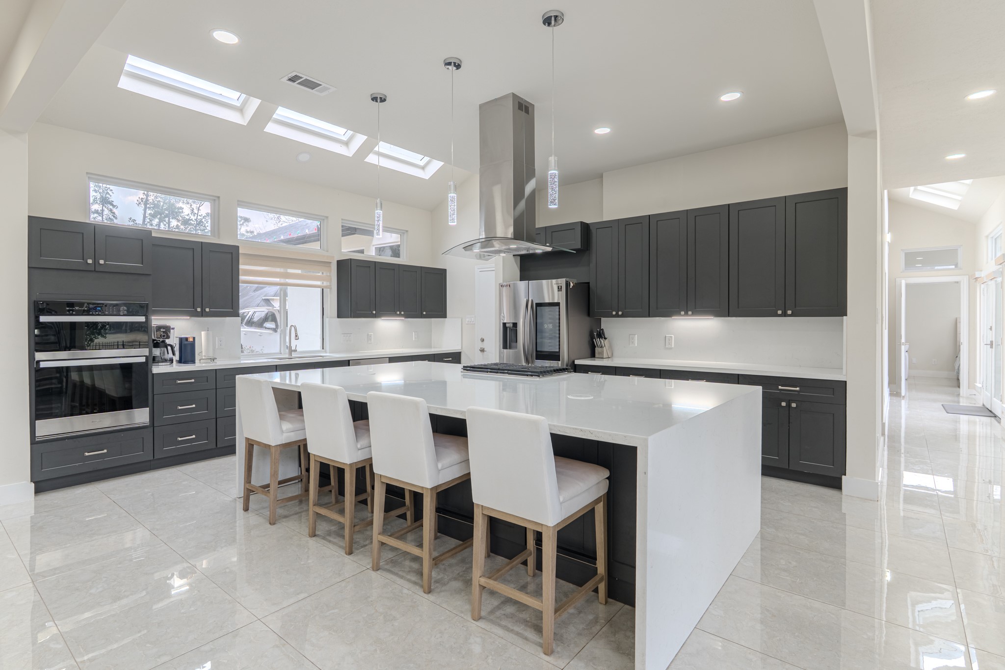 6510 Sussex Court Spring, TX 77389 - Photo 15 of 47 a kitchen with kitchen island granite countertop a sink and counter space