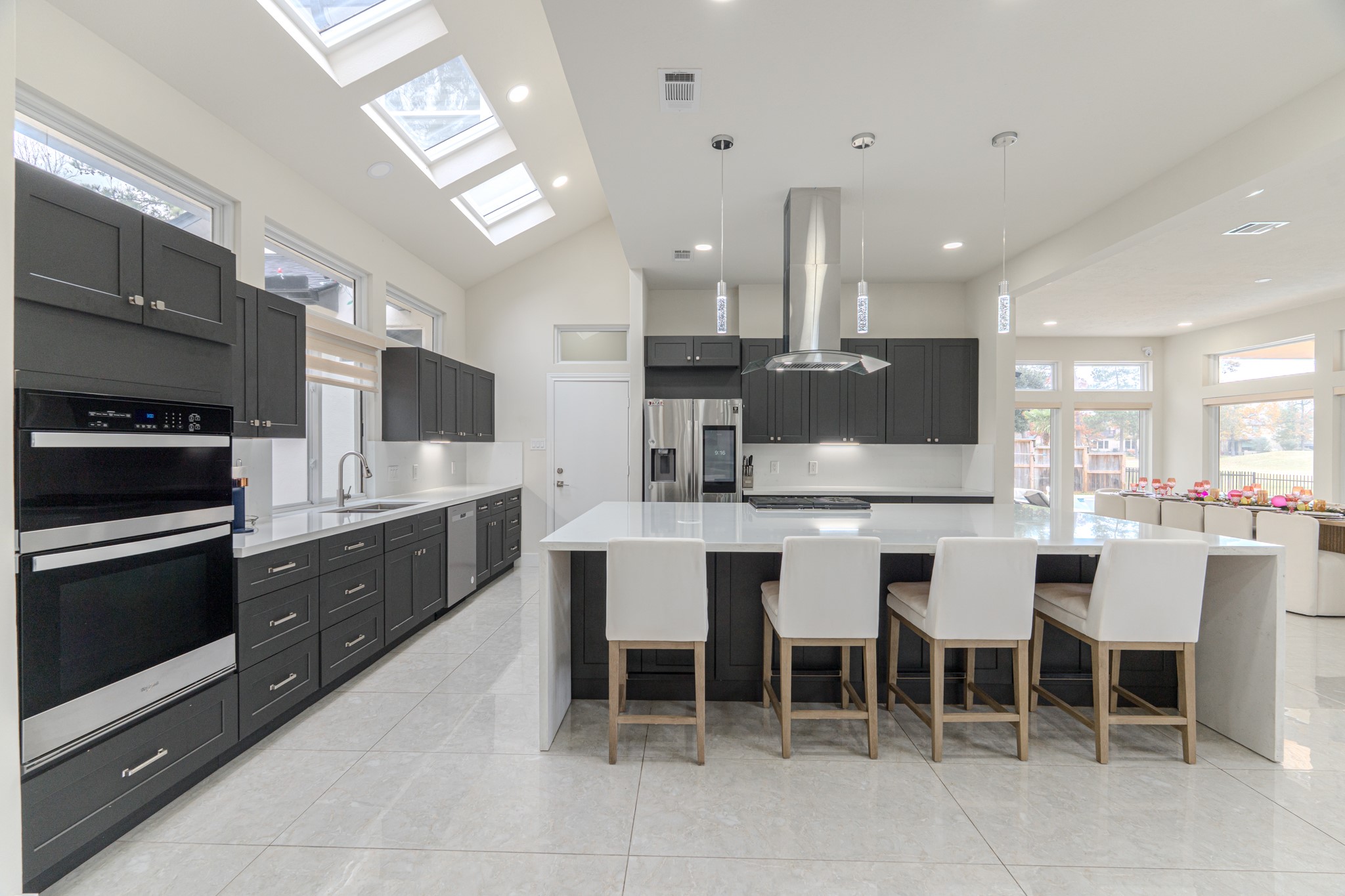 6510 Sussex Court Spring, TX 77389 - Photo 16 of 47 a large kitchen with a table and chairs