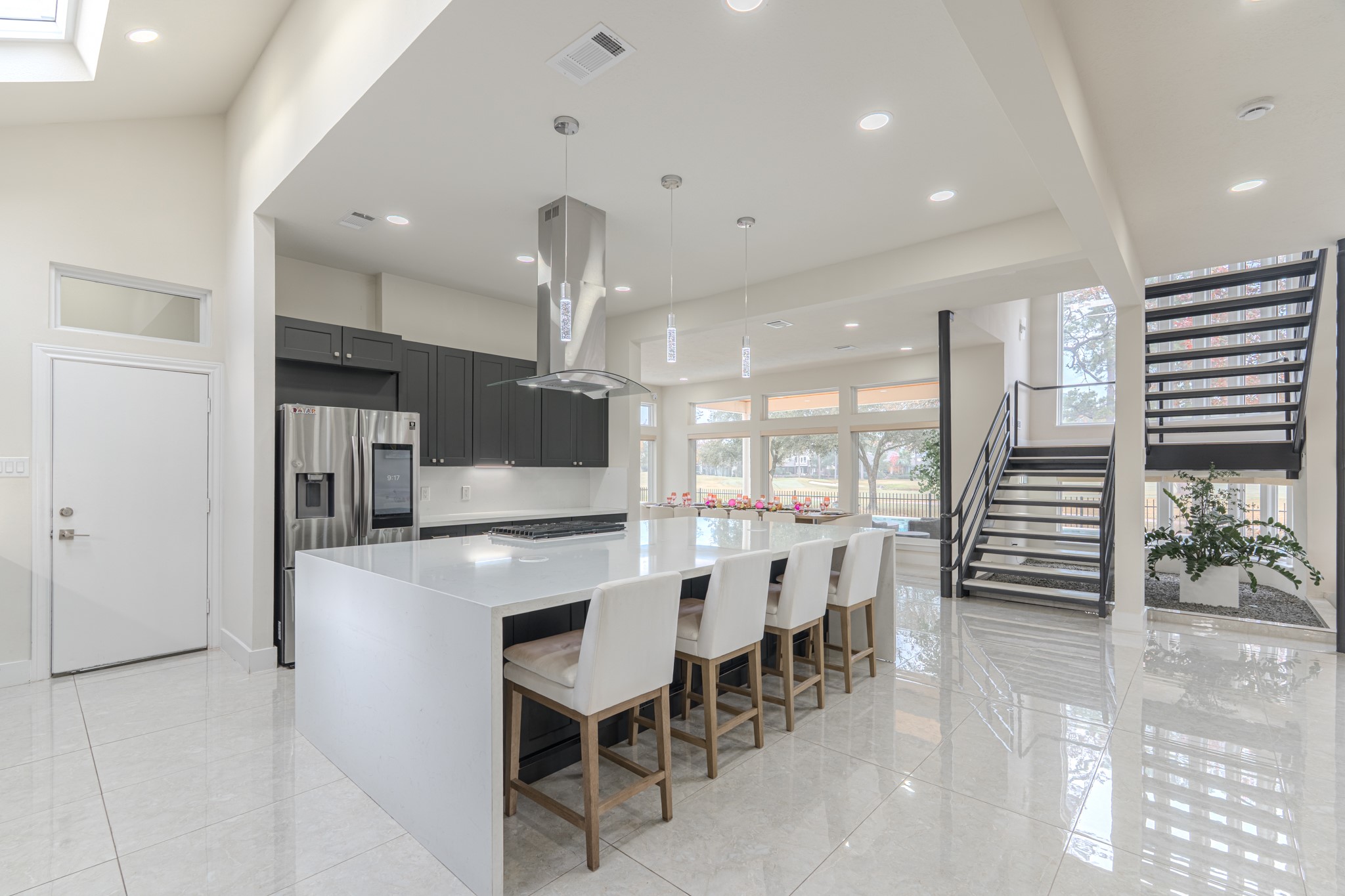 6510 Sussex Court Spring, TX 77389 - Photo 17 of 47 a large kitchen with a table and chairs