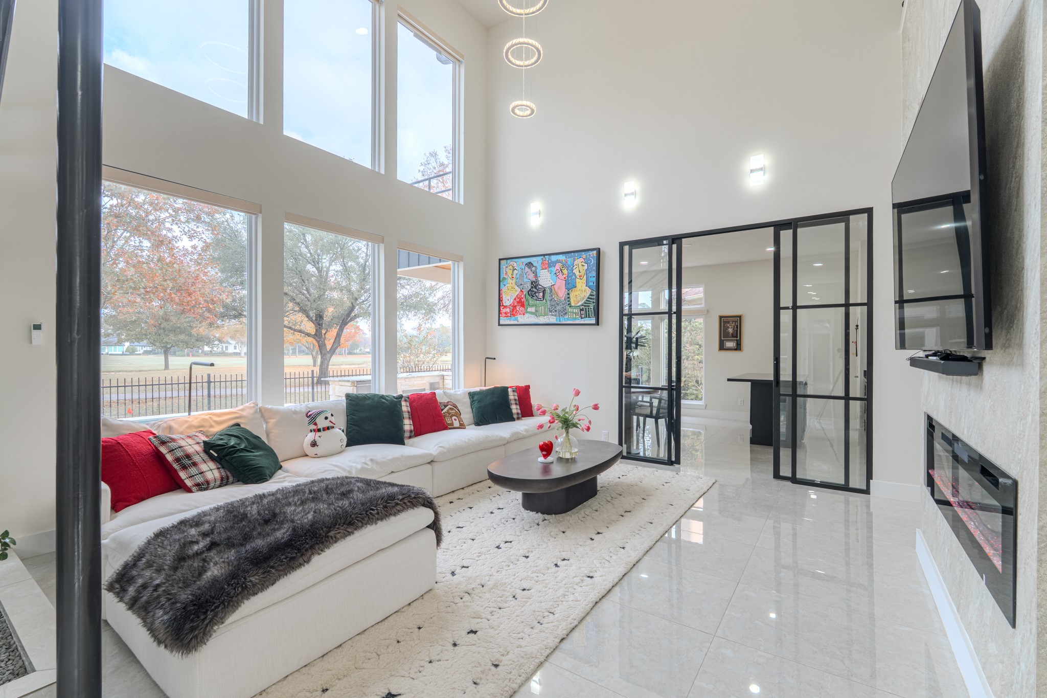 6510 Sussex Court Spring, TX 77389 - Photo 22 of 47 a living room with furniture and a flat screen tv