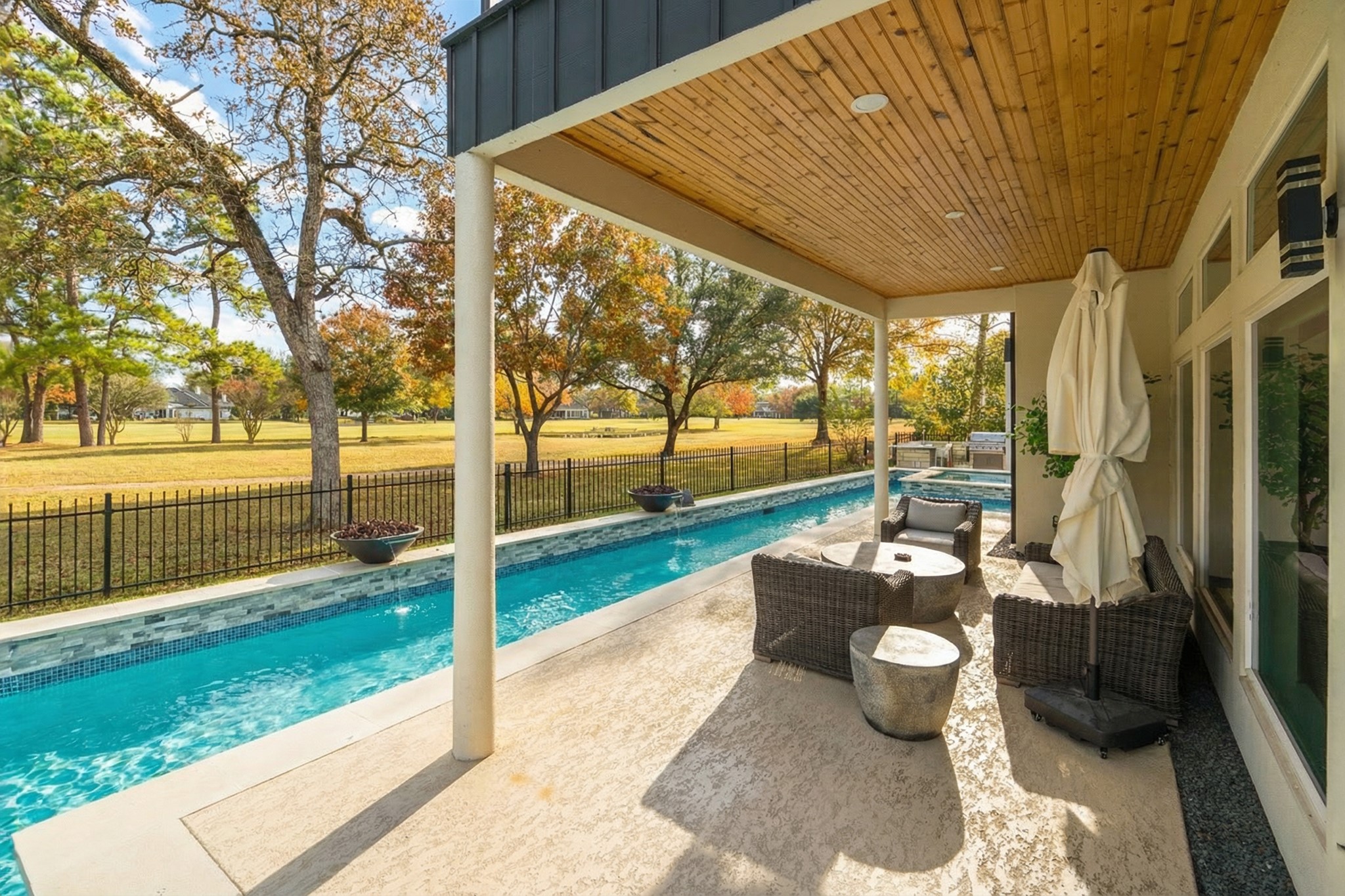 6510 Sussex Court Spring, TX 77389 - Photo 46 of 47 a patio with table and chairs and garden