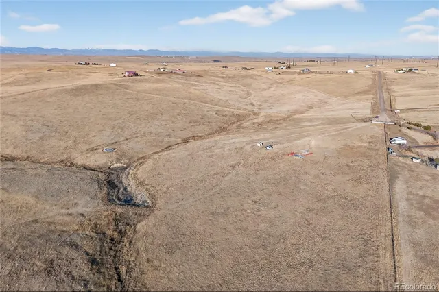 an aerial view of beach and ocean