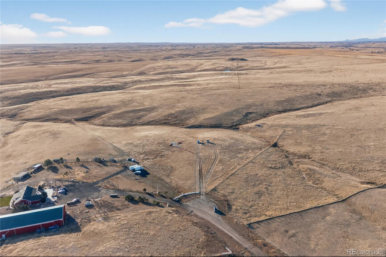 5689 South Tom Bay Road Bennett, CO 80102 - Photo 7 of 19 a view of beach and ocean