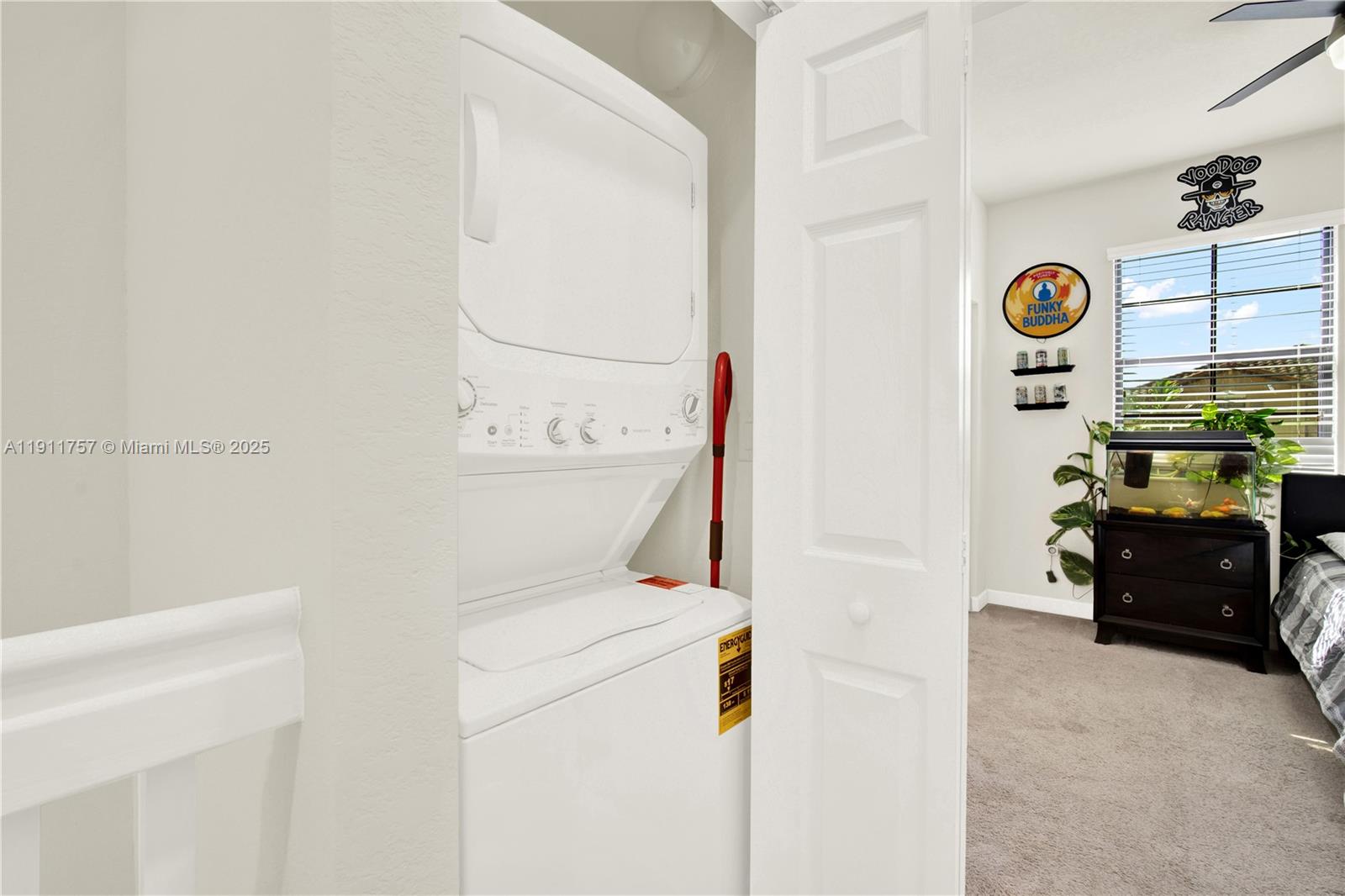 11411 Southwest 248th Lane Homestead, FL 33032 - Photo 27 of 40 a utility room with dryer and washer