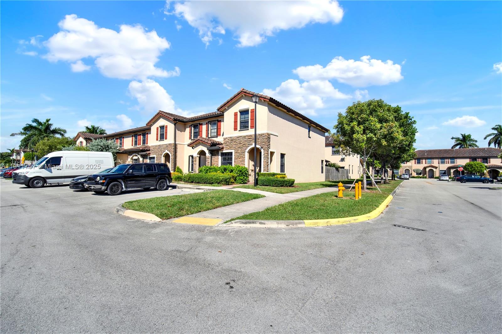 11411 Southwest 248th Lane Homestead, FL 33032 - Photo 29 of 40 a view of street with parked cars