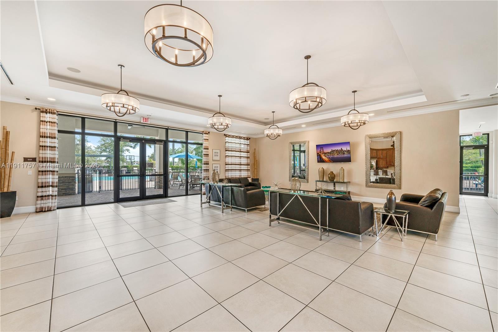 11411 Southwest 248th Lane Homestead, FL 33032 - Photo 36 of 40 a view of a room with gym equipment and large window