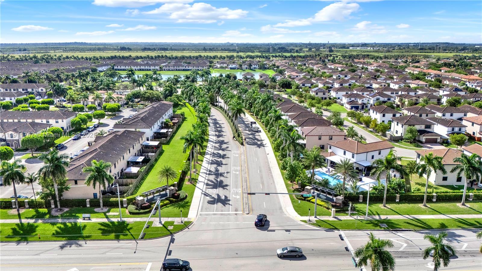 11411 Southwest 248th Lane Homestead, FL 33032 - Photo 39 of 40 an aerial view of residential houses with outdoor space and street view
