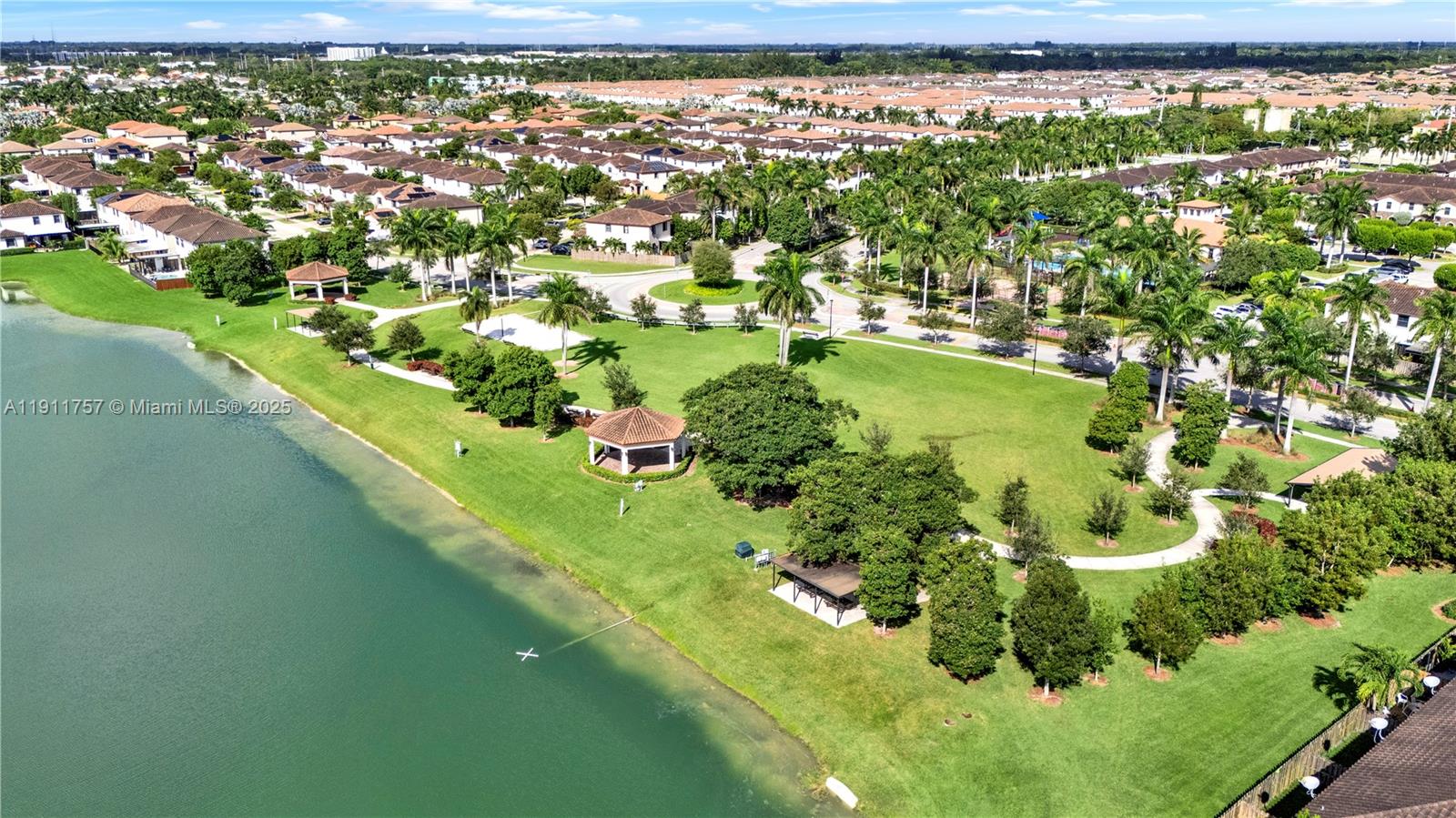 11411 Southwest 248th Lane Homestead, FL 33032 - Photo 40 of 40 a view of a lake with a yard