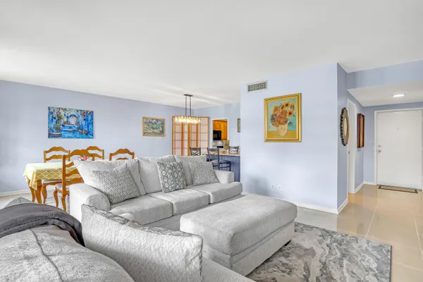 a living room with furniture and a couch