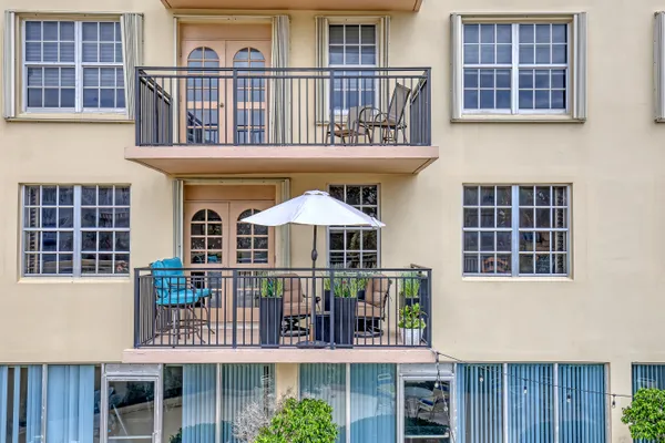 front view of a house with large windows