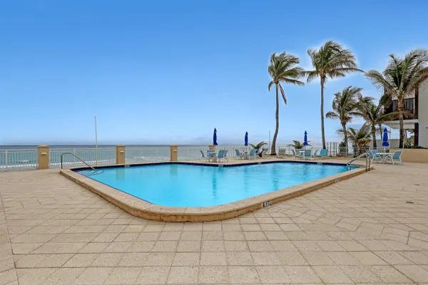 a view of outdoor space with swimming pool