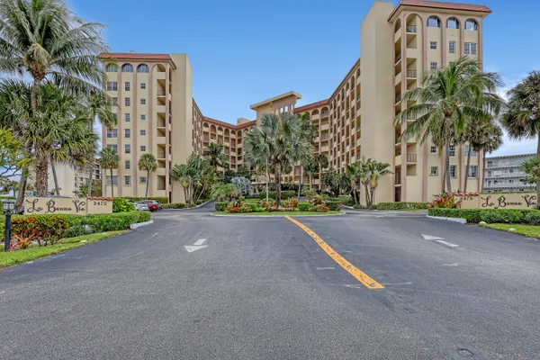 a view of a street with a building