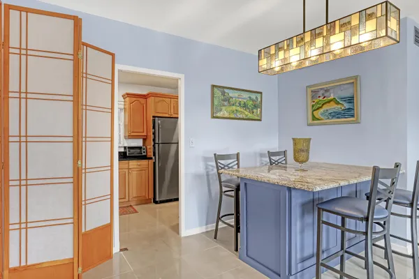 a view of a workspace with furniture