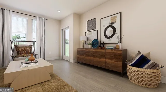 a living room with furniture and a window