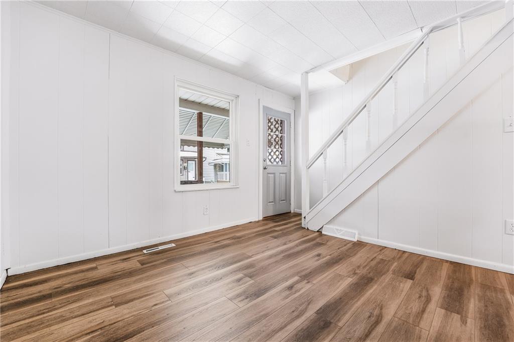 315 Mitchell Avenue Butler, PA 16001 - Photo 11 of 19 a view of an entryway with wooden floor
