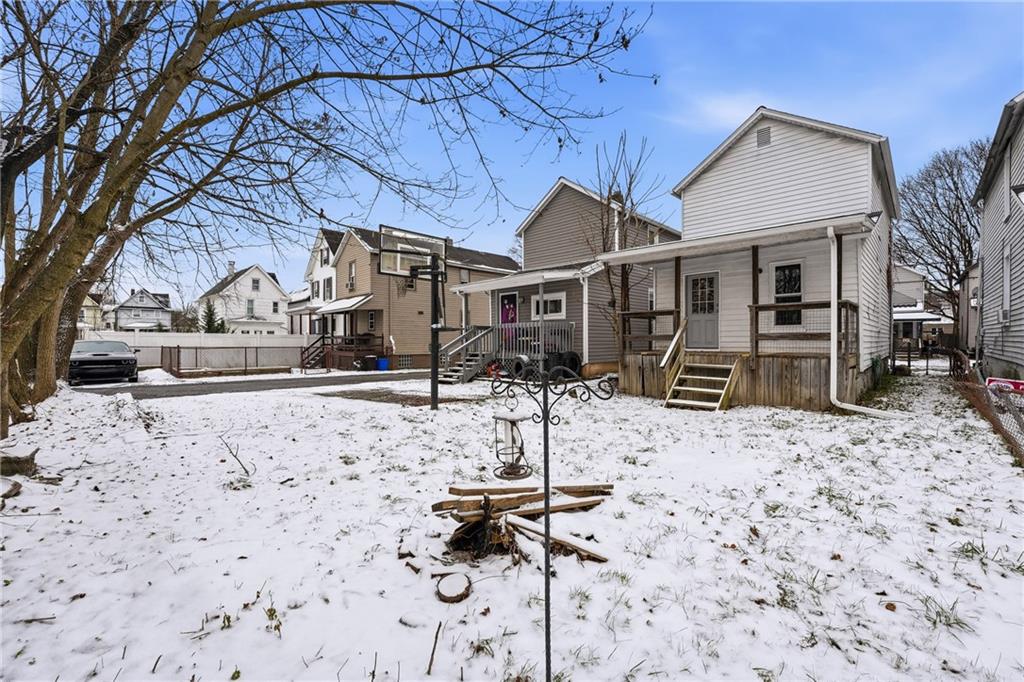 315 Mitchell Avenue Butler, PA 16001 - Photo 2 of 19 a front view of a house with snow on the road